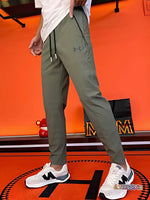 Under Armour - Pantalones de rendimiento unisex ultra elásticos