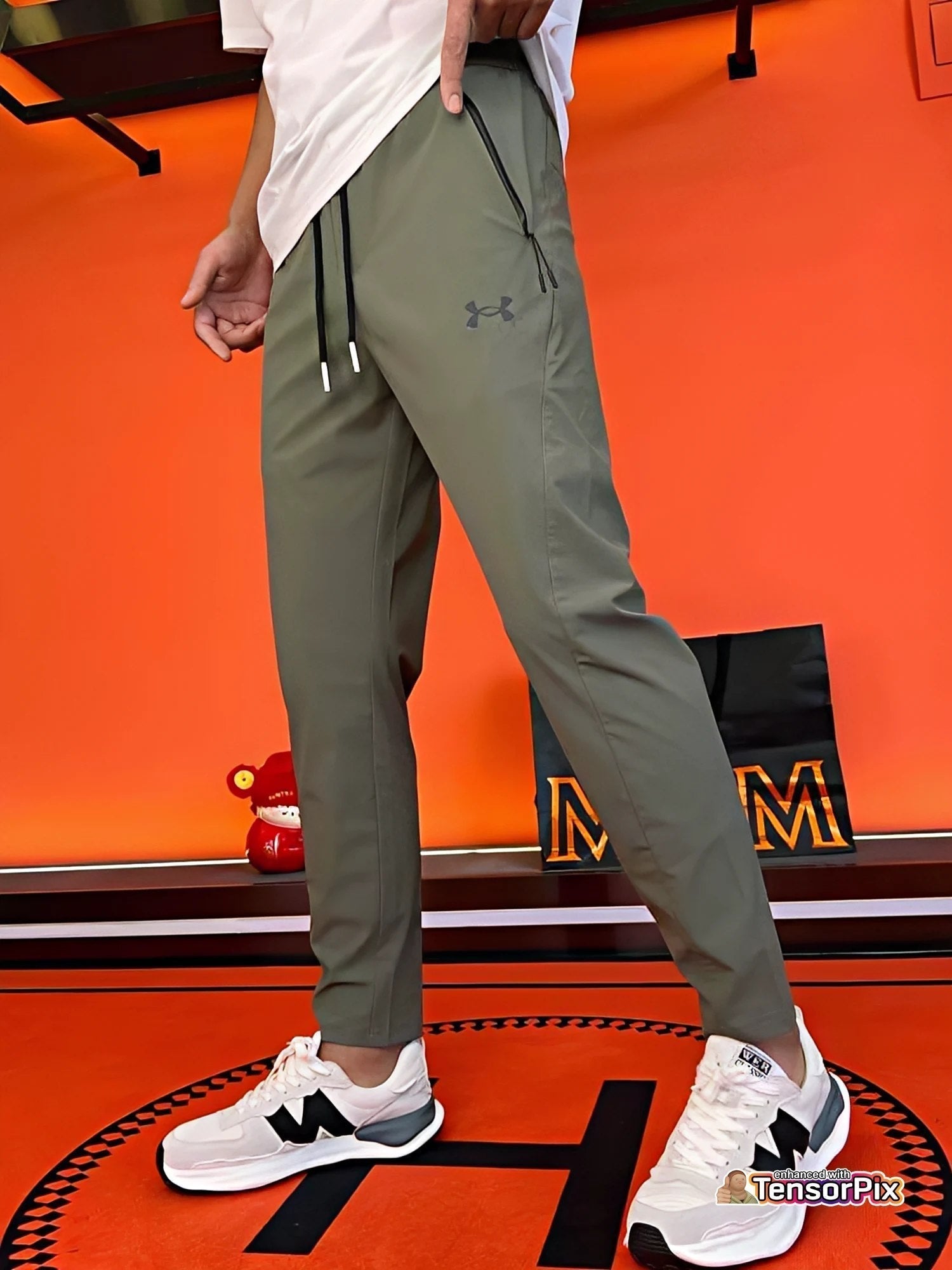 Under Armour - Pantalones de rendimiento unisex ultra elásticos