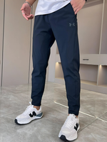 Under Armour - Pantalones de rendimiento unisex ultra elásticos